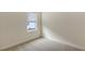 Well-lit bedroom with neutral walls, carpet, and window at 18265 Vizcaya Ct, Venice, FL 34293