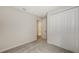 Spacious bedroom with carpet and access to hallway at 18265 Vizcaya Ct, Venice, FL 34293
