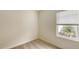 Cozy bedroom with carpet flooring and window at 18265 Vizcaya Ct, Venice, FL 34293