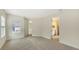Spacious bedroom with carpet flooring and access to a private bathroom at 18265 Vizcaya Ct, Venice, FL 34293