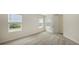 Bright bedroom featuring neutral walls and carpet flooring at 18265 Vizcaya Ct, Venice, FL 34293