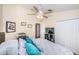Bedroom with a queen-size bed, ceiling fan, and TV at 7001 Interbay Blvd # 336, Tampa, FL 33616