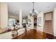 Bright dining room with hardwood floors and chandelier at 7001 Interbay Blvd # 336, Tampa, FL 33616