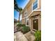 Front door entrance to townhome with landscaping at 7001 Interbay Blvd # 336, Tampa, FL 33616