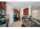 Modern kitchen featuring granite countertops and stainless steel appliances at 7001 Interbay Blvd # 336, Tampa, FL 33616
