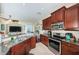 Kitchen with stainless steel appliances and granite countertops at 7001 Interbay Blvd # 336, Tampa, FL 33616