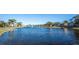 Waterfront view of a community with homes and landscaping at 7001 Interbay Blvd # 336, Tampa, FL 33616