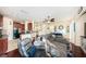 Open concept living room with hardwood floors and kitchen view at 7001 Interbay Blvd # 336, Tampa, FL 33616