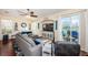 Living room with access to backyard patio and view of water at 7001 Interbay Blvd # 336, Tampa, FL 33616