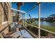Screened patio overlooking a lake with comfy seating at 7001 Interbay Blvd # 336, Tampa, FL 33616