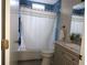 Modern bathroom with updated vanity and blue tile at 9330 Hampshire Park Dr, Tampa, FL 33647