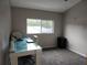 Bright bedroom with a workspace and plenty of natural light at 9330 Hampshire Park Dr, Tampa, FL 33647