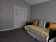 Cozy bedroom with daybed, and plenty of closet space at 9330 Hampshire Park Dr, Tampa, FL 33647