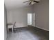 Spacious bedroom with carpeted floor, ceiling fan, and large closet at 9330 Hampshire Park Dr, Tampa, FL 33647