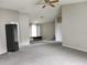 Large bedroom with carpet, window and ceiling fan at 9330 Hampshire Park Dr, Tampa, FL 33647