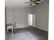 Spacious bedroom with carpeted floor, ceiling fan, and large closet at 9330 Hampshire Park Dr, Tampa, FL 33647