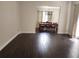 Spacious living room with hardwood floors and natural light at 9330 Hampshire Park Dr, Tampa, FL 33647