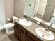 Bathroom with double vanity and granite countertops at 11105 Sage Canyon Dr, Riverview, FL 33578