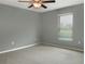 Bright bedroom with neutral walls and plush carpeting at 11105 Sage Canyon Dr, Riverview, FL 33578