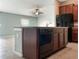 Kitchen island with granite countertops and stainless steel dishwasher at 11105 Sage Canyon Dr, Riverview, FL 33578