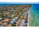 Aerial view of Anna Maria Island home near beach and water at 505 S Bay Blvd, Anna Maria, FL 34216