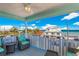 Relaxing balcony overlooking the ocean and neighborhood at 505 S Bay Blvd, Anna Maria, FL 34216