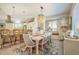 Bright dining room featuring a large table and chandelier at 505 S Bay Blvd, Anna Maria, FL 34216