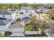 Modern two-story house with a detached garage and a small yard at 1939 W Arch St, Tampa, FL 33607