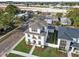Two-story house with brown roof and landscaping at 1939 W Arch St, Tampa, FL 33607