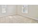 Spacious bedroom with plush carpeting and large window at 1939 W Arch St, Tampa, FL 33607