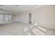 Spacious bonus room with neutral carpet, large windows, and ample natural light at 1939 W Arch St, Tampa, FL 33607