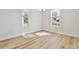 Dining room with hardwood floors and lots of natural light at 1939 W Arch St, Tampa, FL 33607