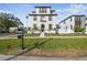 Two-story house, front yard, and walkway leading to the entrance at 1939 W Arch St, Tampa, FL 33607