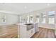 Modern kitchen with stainless steel sink and white cabinets at 1939 W Arch St, Tampa, FL 33607