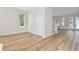 Spacious living room with hardwood floors and large windows at 1939 W Arch St, Tampa, FL 33607