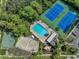 Community pool, tennis courts, and basketball court at 528 Black Lion Ne Dr, St Petersburg, FL 33716