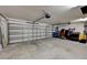 Two-car garage with automatic door opener and ample storage space at 288 Rain Berry Ave, Ruskin, FL 33570