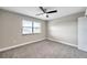 Spacious bedroom with carpeted floor and ceiling fan at 1707 Tahoe Dr, Sun City Center, FL 33573