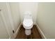 Clean bathroom with a new toilet and wood-look flooring at 3708 Wiggins Leaf St, Tampa, FL 33619