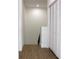 Upstairs hallway with linen closet and wood flooring at 3708 Wiggins Leaf St, Tampa, FL 33619