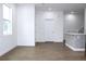 Spacious living room with hardwood floors and neutral walls at 3708 Wiggins Leaf St, Tampa, FL 33619