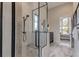 Spa-like bathroom with walk-in shower and modern fixtures at 9586 Troutwater Ln, Tampa, FL 33618