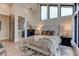 Bright bedroom with a plush bed, and an ensuite bathroom at 9586 Troutwater Ln, Tampa, FL 33618