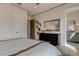Modern bedroom with ensuite bathroom access and stylish decor at 9586 Troutwater Ln, Tampa, FL 33618