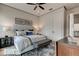 Spacious bedroom with large windows, comfortable bed, and stylish decor at 9586 Troutwater Ln, Tampa, FL 33618