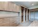 Large walk-in closet, built-in shelves, drawers, and hanging rods at 9586 Troutwater Ln, Tampa, FL 33618