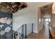 Modern hallway with stylish light fixture and open view to other rooms at 9586 Troutwater Ln, Tampa, FL 33618