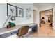 Bright home office with a large desk and built in shelving at 9586 Troutwater Ln, Tampa, FL 33618