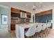Modern kitchen with wood cabinetry and marble countertops at 9586 Troutwater Ln, Tampa, FL 33618