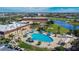 Aerial view of community pool and surrounding area at 1032 Radison Ave # 2, Sun City Center, FL 33573